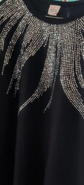 Elegant Black Top with Silver Accents